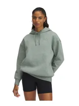 Buzo Under Armour de mujer, color verde grisáceo, corte holgado, con capucha y cordones ajustables.
