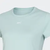 Remera deportiva Reebok ID Train color verde agua, de corte clásico, cuello redondo y mangas cortas.