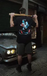 Remera negra de algodón con estampado frontal de la frase "Au revoir, shoshanna!" en letras blancas.