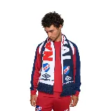 Bufanda de punto tricotada con los colores del Club Nacional de Football, con el escudo del club y el logo de Umbro. Incluye flecos en los extremos.