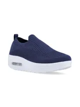 Zapatilla azul marino de flyknit con suela blanca y burbuja de aire.