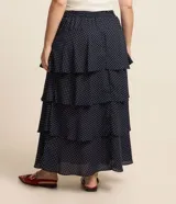 Pollera midi de crepé azul marino con lunares blancos, cintura elástica y volados en capas.