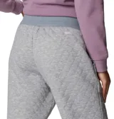 Pantalón deportivo acolchado para mujer, de corte cómodo y cintura elástica ajustable, con bolsillos laterales.
