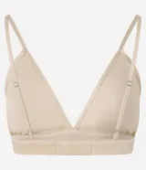 Top cropped femenino con escote en V, breteles finos ajustables y tejido cubierto de lentejuelas.