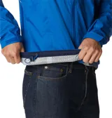 Campera impermeable Columbia Evapouration Jacket, color celeste, con capucha ajustable, cierre frontal completo, bolsillos laterales con cierre y ventilación en las axilas.