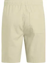 Bermuda color beige de algodón regenerativo, con cintura elástica, bolsillos laterales y traseros.