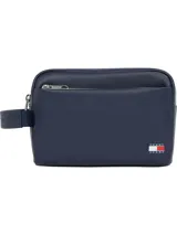 Neceser azul marino de Tommy Jeans con textura granulada, cierre de cremallera, asa lateral, bolsillo exterior con cremallera, bolsillo interior abierto y logo de la marca en el frente.