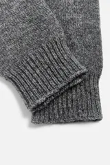 Guantes tejidos de punto en hilatura de lana y cashmere color marrón.