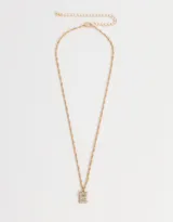 Cadena corta dorada con dije de la letra A cubierto de strass.