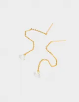 Aros colgantes largos con cadena bañada en oro y dije de strass con forma de cristal.