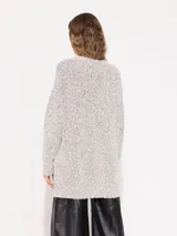 Sweater holgado color gris jaspeado, tejido en mezcla de algodón y lurex, con largo hasta la cadera.