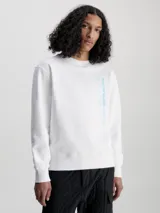 Buzo blanco de felpa de algodón con cuello redondo, puños y bajo acanalados. Estampado vertical con el logo de Calvin Klein Jeans en celeste en el lateral.