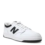 Championes New Balance 480 de cuero blanco con detalles en negro, cordones blancos y logo "N" en negro en los laterales.