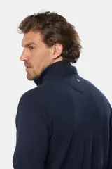 Campera azul de tejido fino, con cierre frontal y detalles en cuero ecológico. Confeccionada 100% en algodón.