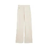 Pantalón de jogging color crema, de corte ancho y cintura alta con cordón ajustable.