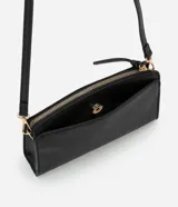 Cartera transversal pequeña de PU color negro, con cierre de cremallera y correa larga.