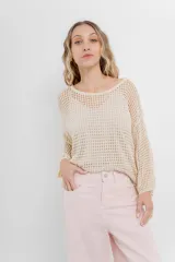 Buzo negro de punto abierto con diseño calado, mangas largas abullonadas y cuello redondo.
