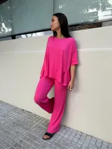 Pantalón palazzo color ladrillo, de morley de viscosa, con cintura elastizada y cordón blanco ajustable.