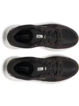 Championes Under Armour Charged Versurge para hombre, color negro con detalles en blanco y suela color caramelo.