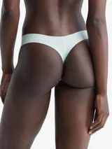 Colaless color celeste de microfibra suave con bordes cortados a láser y logo de Calvin Klein estampado en la cadera.