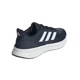 Championes Adidas Ultrarun 5 color azul marino con las tres tiras blancas.