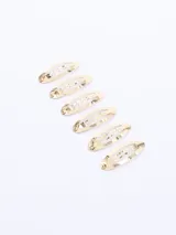Set de seis hebillas doradas para el pelo, tipo sapitos.