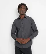 Camisa social de hombre, de manga larga con estampado de cuadros en tonos grises.