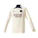 Buzo de entrenamiento Nike del Paris Saint-Germain, modelo Strike. Color crema con detalles en azul marino en cuello y hombros. Cuenta con cierre corto en el cuello, logo de Nike bordado en el pecho y escudo del PSG.