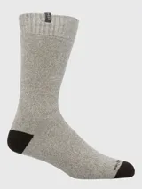 Calcetines de caña media color beige con talón y puntera en marrón oscuro. Tejido grueso.