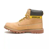 Botas de trabajo Caterpillar modelo Colorado 2.0, color beige con cuello acolchado negro, cordones amarillos y suela marrón.