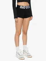 Shorts deportivos Diesel Arianna-Pop negros con cintura elástica ancha con logo Diesel en blanco.