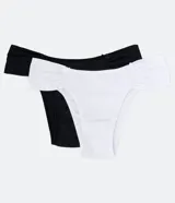 Kit de dos bombachas de bikini sin costuras, confeccionadas en microfibra, con forro. Incluye una bombacha blanca con laterales fruncidos y una bombacha negra con moño decorativo.