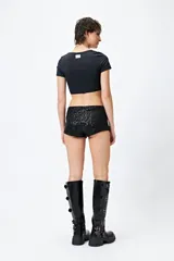Microshort elastizado de lentejuelas negras.