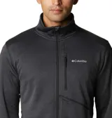 Campera polar Columbia Park View Fleece, color azul jaspeado, con cierre frontal completo, cuello alto, bolsillos laterales con cierre y bolsillo en el pecho con cierre vertical en color verde lima. Cuenta con tecnología Omni-Wick, puños elásticos con orificios para pulgares y protector de barbilla.