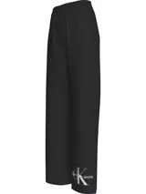 Pantalón de jogging negro de corte ancho, con cintura elástica, bolsillos laterales, aberturas laterales y logo de Calvin Klein estampado en la pierna.