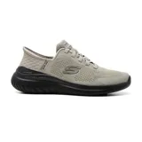 Championes deportivos Skechers Hands Free Slip-ins Bounder 2.0, color beige con suela negra. Diseño con capellada de malla, cordones elásticos, plantilla Skechers Air-Cooled Memory Foam y tecnología Heel Pillow.