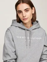 Buzo gris con capucha y cordones ajustables. Logotipo de Tommy Hilfiger bordado en blanco en el pecho y en la manga.
