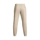 Pantalón de jogging Under Armour color beige, de corte holgado, con cintura elástica ajustable con cordón y puños acanalados.