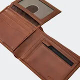 Billetera plegable color negro con el logo de Rip Curl grabado en relieve en el exterior.