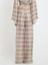 Pantalón de vestir de tiro alto con elástico en la cintura y lentejuelas.