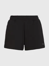 Short deportivo negro de felpa de algodón con cintura elástica, bolsillos laterales y logo de Calvin Klein bordado en el ruedo.