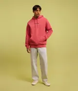 Hoodie color salmón de algodón con felpa, corte comfort, capucha con cordón ajustable, manga larga, bolsillo canguro, barras ajustadas y estampa lettering "Synthetic escape" en frente y espalda.