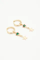 Par de aros dorados tipo argolla con dije colgante de estrella y flor negra.