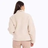 Campera polar color crema con cierre frontal y cuello alto.