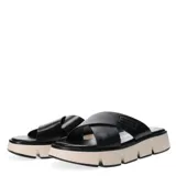 Sandalias Miss Carol modelo Minicoy color verde con tiras cruzadas y plataforma.