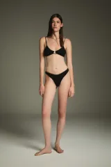 Colaless negra con lurex dorado.