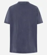 Remera oversized gris con efecto desteñido y estampa frontal con la frase "Glow Up Era".