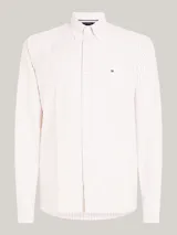 Camisa de algodón Oxford a rayas verticales blancas y beige, de corte regular, con cuello abotonado, mangas largas con puños abotonados y logo de Tommy Hilfiger bordado en el pecho.