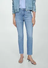 Pantalón de jean celeste de corte skinny, tiro medio y largo cropped. Confeccionado en tejido elástico de algodón.