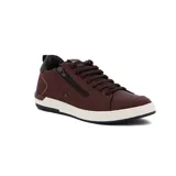 Zapatillas color caramelo con cierre lateral y diseño deportivo, ideales para uso diario.